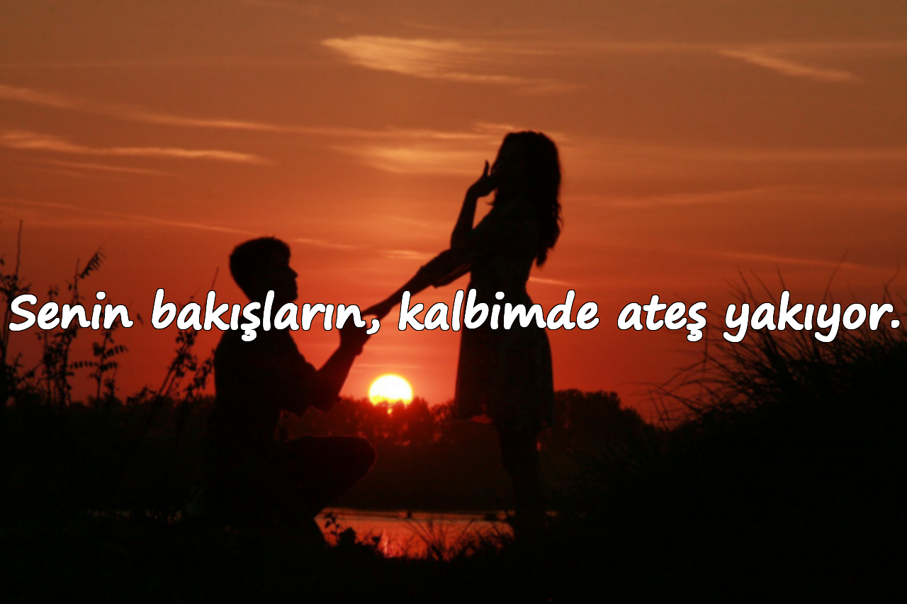 Senin bakışların, kalbimde ateş yakıyor.